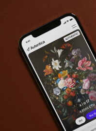 An iPhone displaying the Autentica Marketplace product.